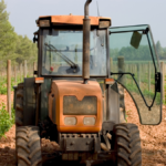 Vineyard mechanization tractor working in a vineyard to improve labor efficiency